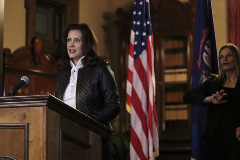 &copy; Reuters. FILE PHOTO: Michigan Governor Gretchen Whitmer speaks during a news conference after thirteen people, including seven men associated with the Wolverine Watchmen militia group, were arrested for alleged plots to take Whitmer hostage and attack the state ca