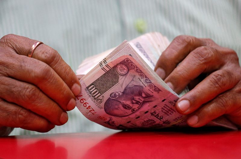 No peace for India's rupee as mighty dollar thunders on: Reuters Poll