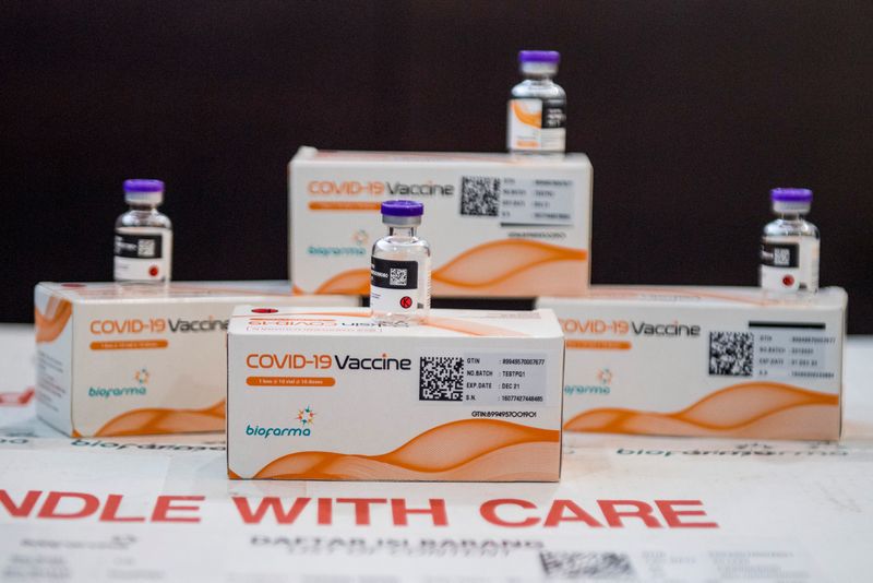 &copy; Reuters. FILE PHOTO: Packages of Bio Farma's coronavirus disease (COVID-19) vaccine are seen at Command Center and Vaccine Distribution Management System (SMDV) of Bio Farma in Bandung, West Java province, Indonesia, January 7, 2021. Antara Foto/M Agung Rajasa via