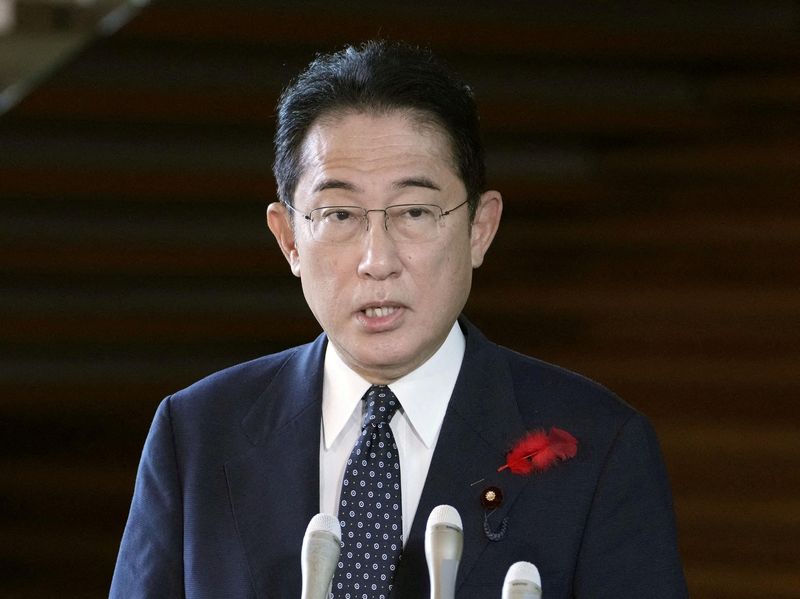 &copy; Reuters. FILE PHOTO: Japan's Prime Minister Fumio Kishida speaks to the media after North Korea fired a ballistic missile over Japan, at his official residence in Tokyo, Japan October 4, 2022, in this photo taken by Kyodo. Mandatory credit Kyodo via REUTERS  