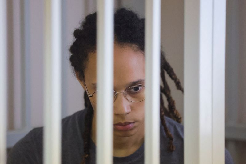 &copy; Reuters. FILE PHOTO: U.S. basketball player Brittney Griner, who was detained at Moscow's Sheremetyevo airport and later charged with illegal possession of cannabis, sits inside a defendants' cage during the reading of the court's verdict in Khimki outside Moscow,