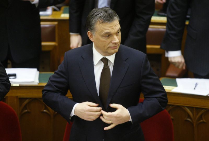 &copy; Reuters. Hungarian Prime Minister Viktor Orban prepares to address Parliament in Budapest February 14, 2011.  Hungary will work out a comprehensive reform programme by March 15 and will enshrine state debt limits in a new constitution, Orban told parliament on Mon