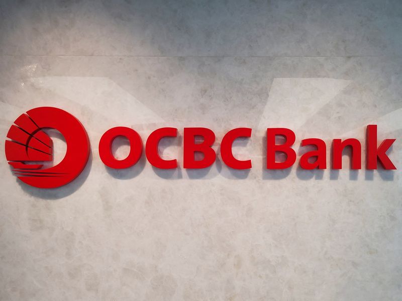 &copy; Reuters. FILE PHOTO: The OCBC Bank logo is seen outside its headquarters after the bank reported its first-half results, in Singapore, August 3, 2022. REUTERS/Anshuman Daga/File Photo