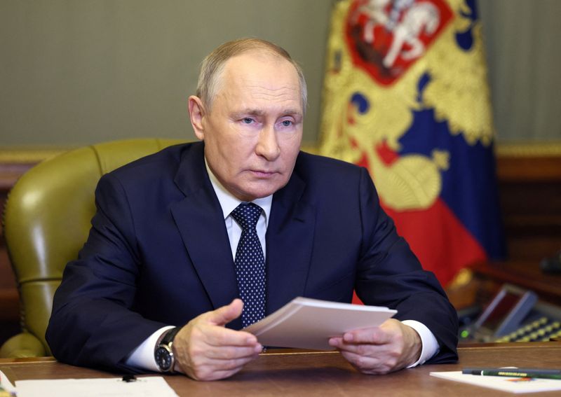 After bridge blast, Putin promises 