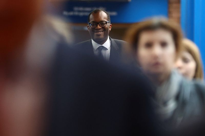 © Reuters. FILE PHOTO: British Chancellor of the Exchequer Kwasi Kwarteng walks at Britain's Conservative Party's annual conference in Birmingham, Britain, October 5, 2022. REUTERS/Hannah McKay