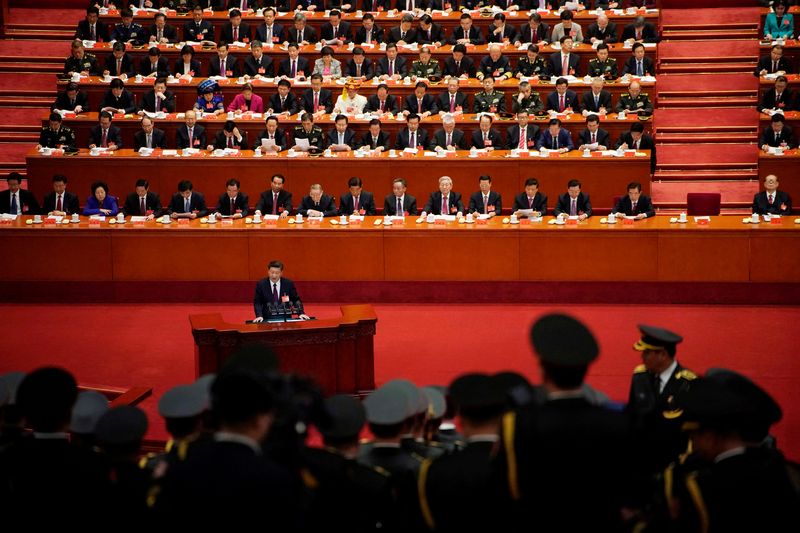 © Reuters. FILE PHOTO: Chinese President Xi Jinping speaks during the opening session of the 19th National Congress of the Communist Party of China at the Great Hall of the People in Beijing, China October 18, 2017.  REUTERS/Aly Song/