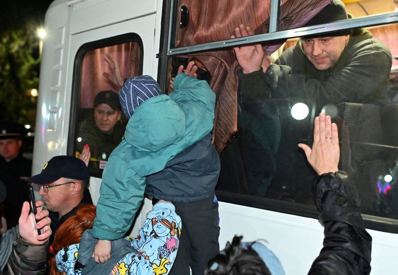 &copy; Reuters. FILE PHOTO: People bid farewell to reservists drafted during the partial mobilisation in the Siberian settlement of Bolsherechye in the Omsk region, Russia September 25, 2022. REUTERS/Alexey Malgavko/File Photo