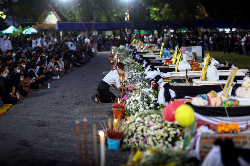 Last goodbyes as Thailand marks lives of child massacre victims