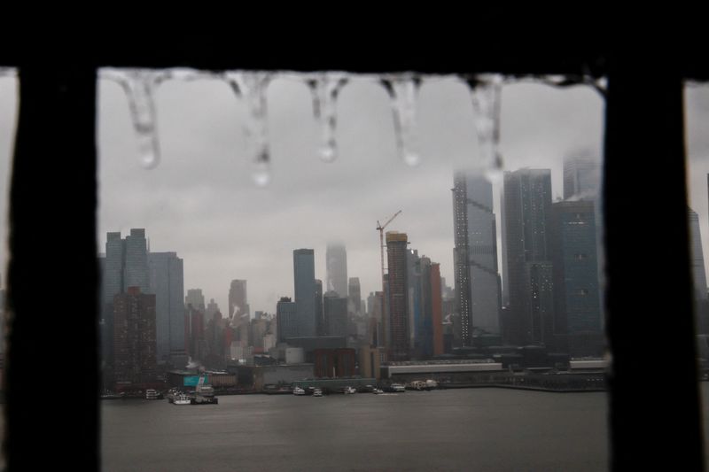&copy; Reuters. FILE PHOTO: The Skyline of New York City is seen covered by clouds during the pass of a winter storm as it is seen from Weehawken, New Jersey, U.S., February 25, 2022. REUTERS/Eduardo Munoz/File Photo