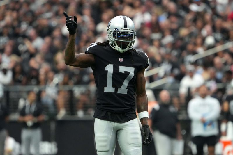 NFL-Raiders' Adams charged with assault for pushing cameraman