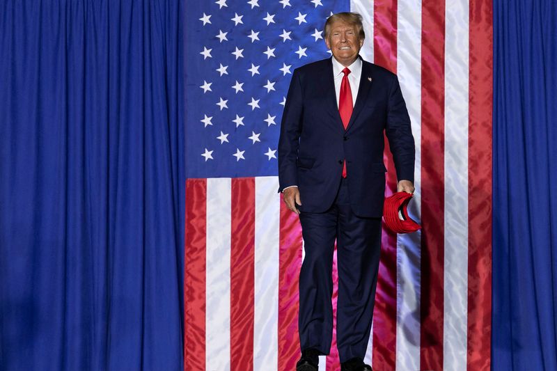 &copy; Reuters. FILE PHOTO: Former U.S. president Donald Trump attends a rally ahead of the midterm elections, in Minden, Nevada, U.S., October 8, 2022.  REUTERS/Carlos Barria/File Photo