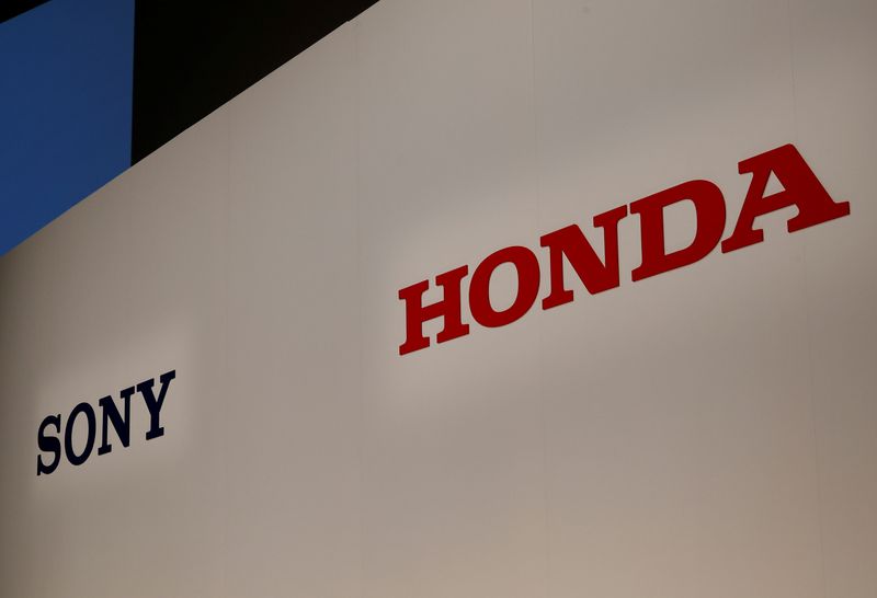 &copy; Reuters. FILE PHOTO: Sony Corp's and Honda Motor's logos are pictured at their joint news conference venue in Tokyo, Japan, March 4, 2022. REUTERS/Kim Kyung-Hoon