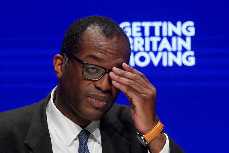 &copy; Reuters. FILE PHOTO: British Chancellor of the Exchequer Kwasi Kwarteng adjusts his glasses during Britain's Conservative Party's annual conference in Birmingham, Britain, October 3, 2022. REUTERS/Toby Melville