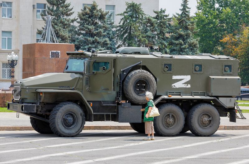 &copy; Reuters. FILE PHOTO: An armoured truck of pro-Russian troops is parked near Ukraine's former regional council's building during Ukraine-Russia conflict in the Russia-controlled city of Kherson, Ukraine July 25, 2022. REUTERS/Alexander Ermochenko