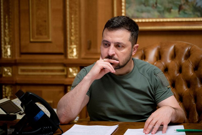 &copy; Reuters. FILE PHOTO: Ukraine's President Volodymyr Zelenskiy is seen during a phone call with U.S. President Joe Biden, amid Russia's attack on Ukraine, in Kyiv, Ukraine October 4, 2022.  Ukrainian Presidential Press Service/Handout via REUTERS