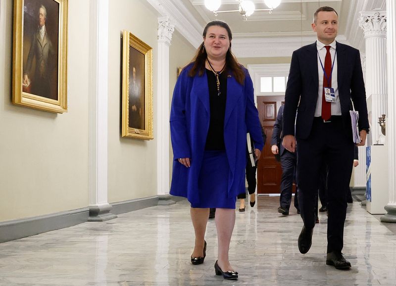 &copy; Reuters. FILE PHOTO: Ukraine's Finance Minister Serhiy Marchenko walks next to Ukrainian ambassador to the U.S. Oksana Markarova as they attend a bilateral meeting with U.S. Treasury Secretary Janet Yellen (not pictured) at the U.S. Treasury Department in Washingt