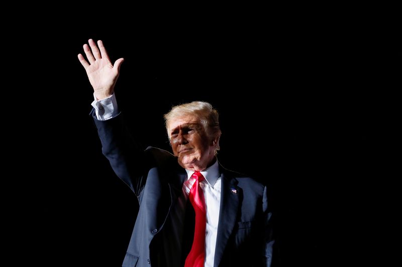 &copy; Reuters. FILE PHOTO: Former U.S. President Donald Trump waves after his speech during a rally at the Iowa States Fairgrounds in Des Moines, Iowa, U.S., October 9, 2021. REUTERS/Rachel Mummey /File Photo