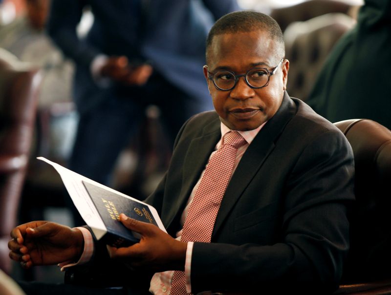 &copy; Reuters. FILE PHOTO - Zimbabwean Finance Minister Mthuli Ncube looks on before the swearing in of new cabinet ministers at State House in Harare, Zimbabwe, September 10, 2018. REUTERS/Philimon Bulawayo