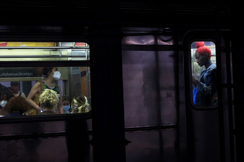 New York City police search for suspect who shoved man onto subway tracks