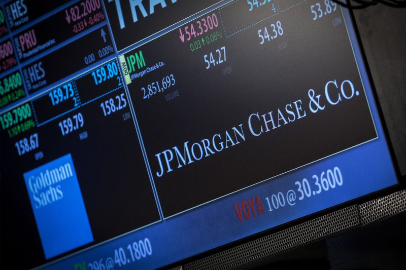 &copy; Reuters. A screen displays JP Morgan Chase & Co. at the post that the stock is traded at on the floor of the New York Stock Exchange, October 21, 2013. REUTERS/Brendan McDermid/Files