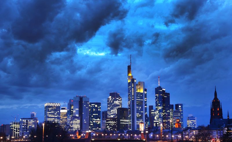 © Reuters. FLE PHOTO: Dark clouds hang over the financial district as the spread of the coronavirus disease (COVID-19) continues during an extended lockdown and a demand by the German government for more home office possibilities in Frankfurt, Germany, February 18, 2021.  REUTERS/Kai Pfaffenbach