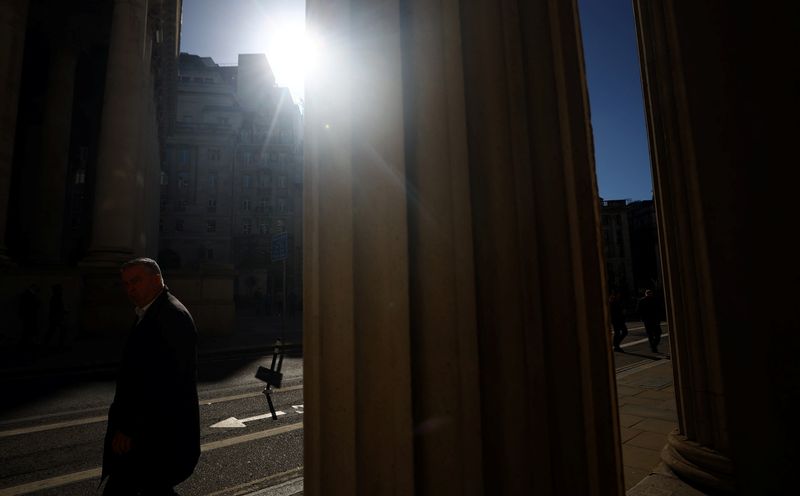 &copy; Reuters. FILE PHOTO: A person walks outside of the Bank of England in London, Britain, October 10, 2022. REUTERS/Hannah McKay