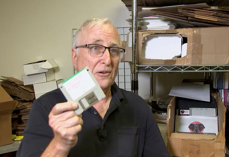 &copy; Reuters. Tom Persky, owner of floppydisk.com and disk trader, shows off a 3.5-inch computer disk at his warehouse in Lake Forest, California, U.S., October 6,2022 in this screengrab from a Reuters TV video. REUTERS/Alan Devall