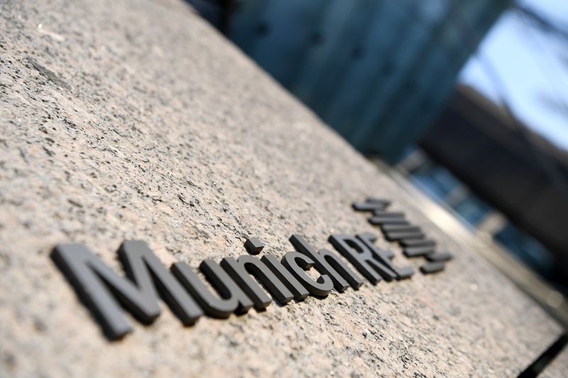 &copy; Reuters. FILE PHOTO: The logo of reinsurance company Munich Re Group is seen next to the entrance of their headquarters as the spread of the coronavirus disease (COVID-19) continues in Munich, Germany, April 4, 2020. REUTERS/Andreas Gebert