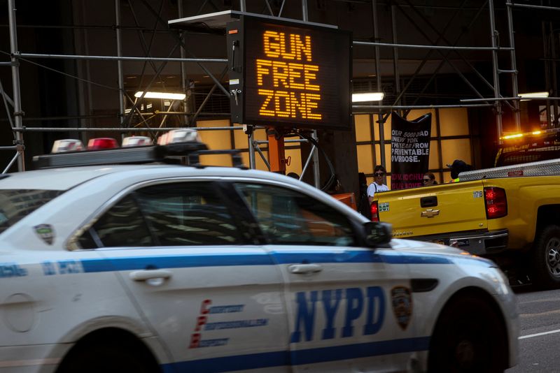 &copy; Reuters. FILE PHOTO - A sign similar to what is to be placed in the Times Square "gun free zone" is seen after a news conference with New York Governor Kathy Hochul and New York City Mayor Eric Adams regarding new gun laws in New York, U.S., August 31, 2022. REUTE