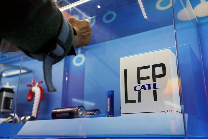 &copy; Reuters. FILE PHOTO: The logo of Chinese battery maker CATL is seen among a display of batteries at an exhibition titled "Forging Ahead in the New Era" during an organised media tour ahead of the 20th National Congress of the Communist Party of China, in Beijing, 