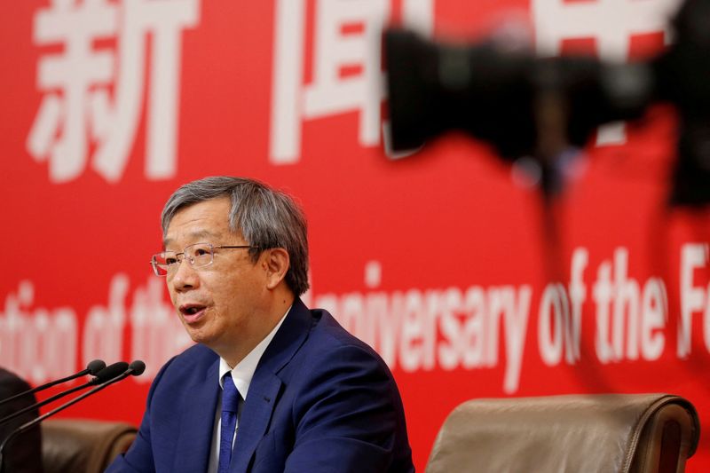 &copy; Reuters. FILE PHOTO: Governor of People's Bank of China (PBOC) Yi Gang attends a news conference on China's economic development ahead of the 70th anniversary of its founding, in Beijing, China September 24, 2019. REUTERS/Florence Lo