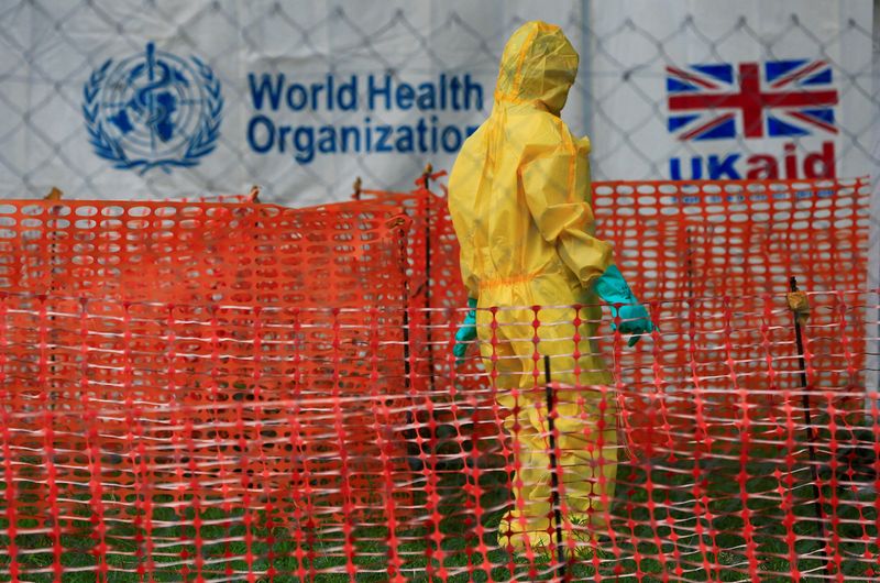 &copy; Reuters. FILE PHOTO: A person dressed in Ebola protective apparel is seen inside an Ebola care facility at the Bwera general hospital near the border with the Democratic Republic of Congo in Bwera, Uganda, June 14, 2019. REUTERS/James Akena?/File Photo