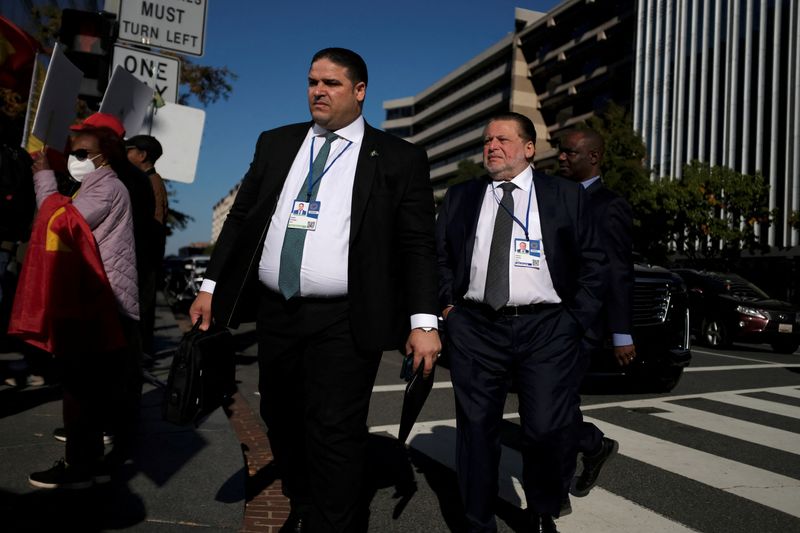 &copy; Reuters. FILE PHOTO: Governor of the Central Bank of Egypt Hassan Abdalla arrives at IMF headquarters during the Annual Meetings of the International Monetary Fund and World Bank in Washington, U.S., October 15, 2022. REUTERS/James Lawler Duggan