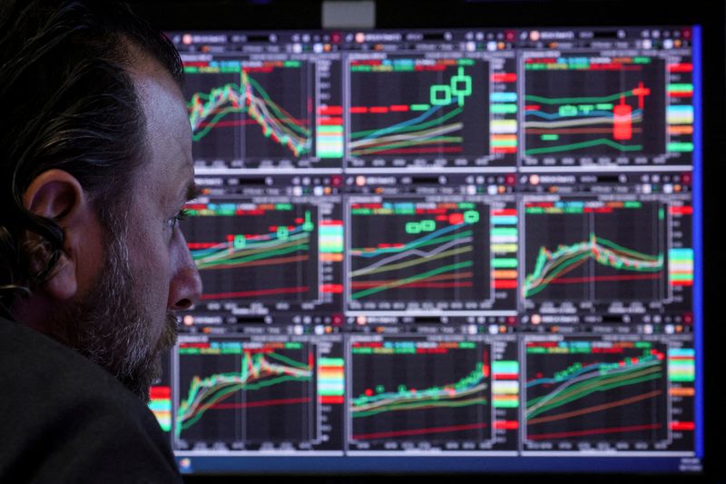 &copy; Reuters. FILE PHOTO: A specialist trader works on the floor of the New York Stock Exchange (NYSE) in New York City, U.S., October 17, 2022. REUTERS/Brendan McDermid/File Photo