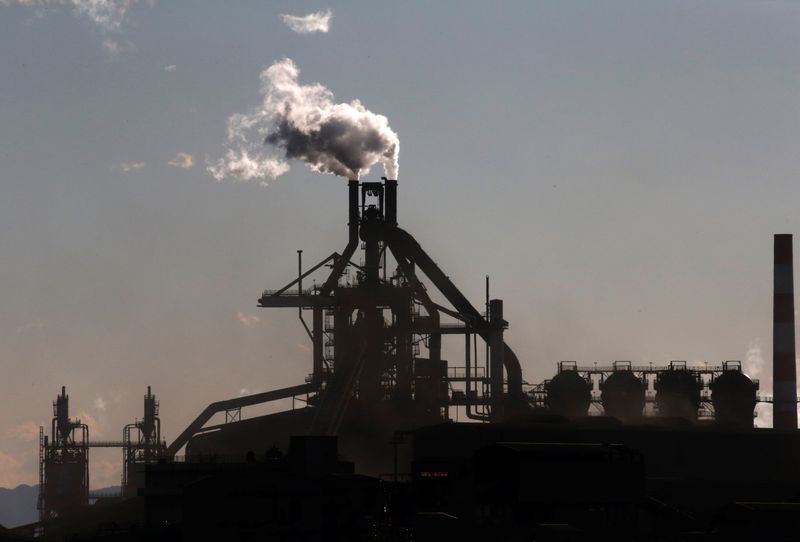 &copy; Reuters. FILE PHOTO: Chimneys of a steel factory are pictured at an industrial area in Kawasaki, Japan, January 16, 2017. REUTERS/Kim Kyung-Hoon