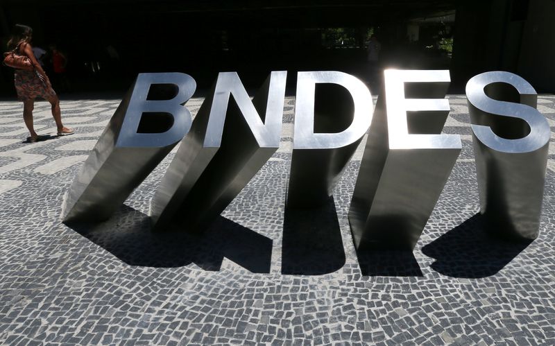 &copy; Reuters. FILE PHOTO: A sign at the main entrance of the Brazilian National Development Bank (BNDES) building is seen in Rio de Janeiro, Brazil January 8, 2019. REUTERS/Sergio Moraes