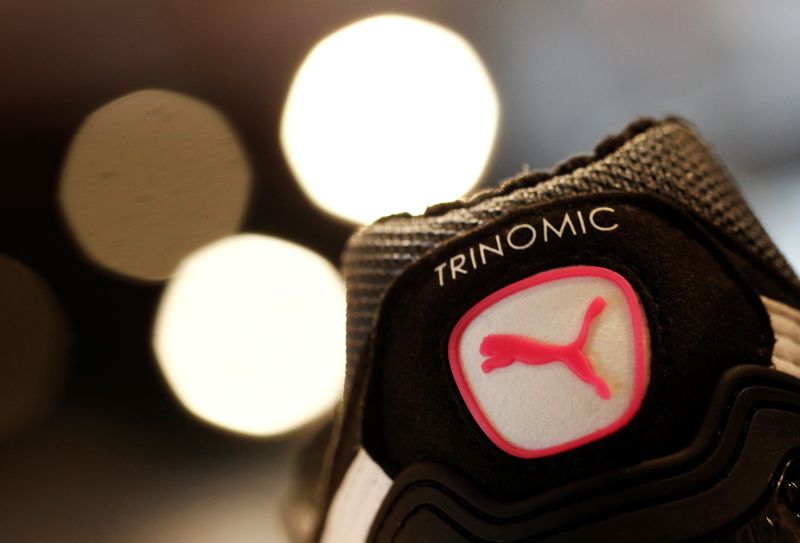 &copy; Reuters. FILE PHOTO: The logo of German sports goods firm Puma is seen on a shoe after the company's annual news conference in Herzogenaurach February 20, 2014.    REUTERS/Michaela Rehle