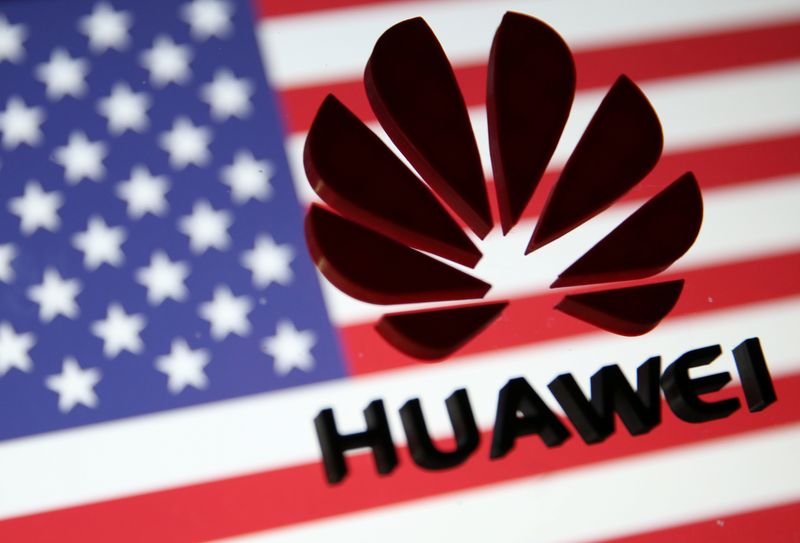 &copy; Reuters. FILE PHOTO: A 3D printed Huawei logo is placed on glass above displayed US flag in this illustration taken January 29, 2019. REUTERS/Dado Ruvic/Illustration