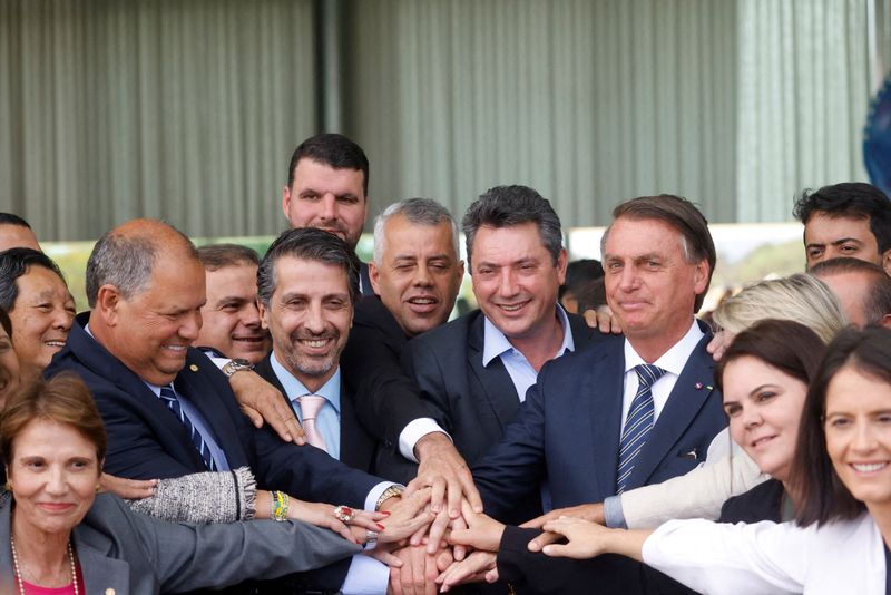 &copy; Reuters. FILE PHOTO: Brazil's President and candidate for re-election Jair Bolsonaro and agribusiness parliamentarians attend a news conference at the Alvorada Palace in Brasilia, Brazil October 5, 2022. REUTERS/Adriano Machado/File Photo