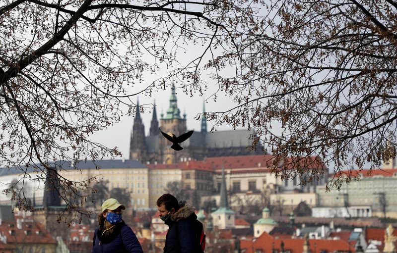 &copy; Reuters. FILE PHOTO: People walk on a street in Prague, Czech Republic, December 28, 2020.  REUTERS/David W Cerny