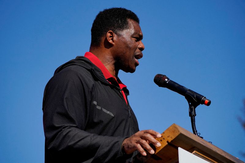 &copy; Reuters. FILE PHOTO: U.S. Senate candidate and former football player Herschel Walker speaks during his campaign rally in Americus, Georgia, U.S., October 21, 2022.  REUTERS/Cheney Orr/File Photo