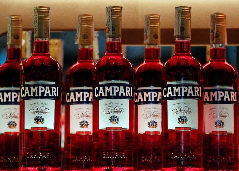 &copy; Reuters. FILE PHOTO: Campari bottles are seen in a bar downtown Milan, Italy, September 4, 2018. Picture taken September 4, 2018. REUTERS/Stefano Rellandini