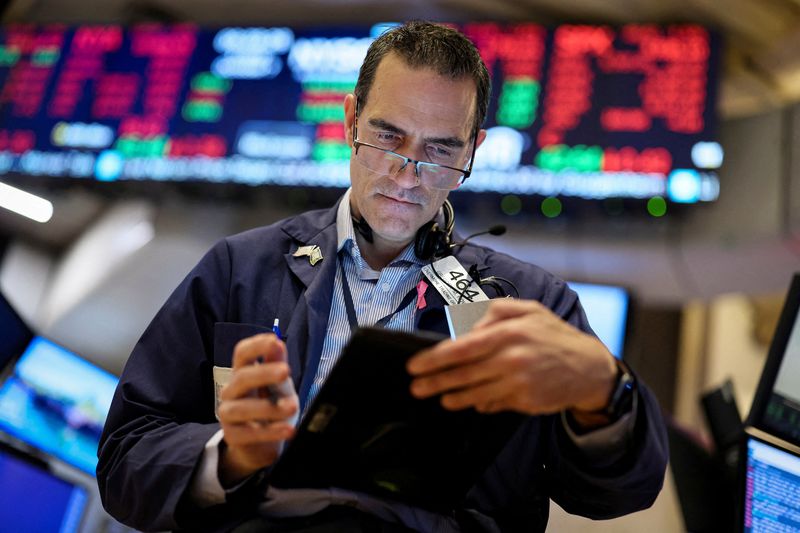 &copy; Reuters. FILE PHOTO: A trader works on the floor of the New York Stock Exchange (NYSE) in New York City, U.S., October 7, 2022. REUTERS/Brendan McDermid