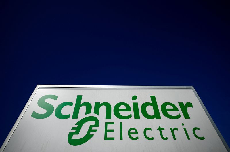 &copy; Reuters. FILE PHOTO: The logo of Schneider Electric is seen outside a company building in Nantes, France, September 20, 2022. REUTERS/Stephane Mahe