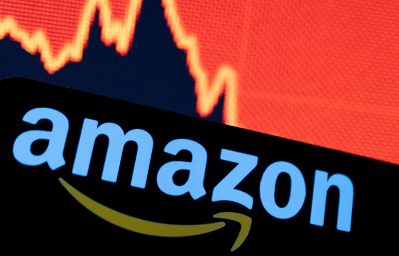 &copy; Reuters. FILE PHOTO: Amazon logo is seen in front of a decreasing stock graph in this illustration taken April 29, 2022. REUTERS/Dado Ruvic/Illustration/File Photo