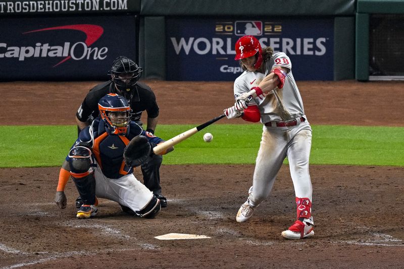 &copy; Reuters. Oct 29, 2022; Houston, Texas, USA; Philadelphia Phillies third baseman Alec Bohm (28) hits a double against the Houston Astros during the ninth inning during game two of the 2022 World Series at Minute Maid Park. Mandatory Credit: Jerome Miron-USA TODAY S