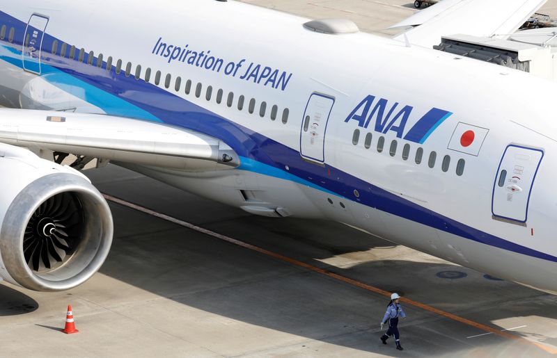 Japan carrier ANA Holdings posts half-year profit, raises full-year target