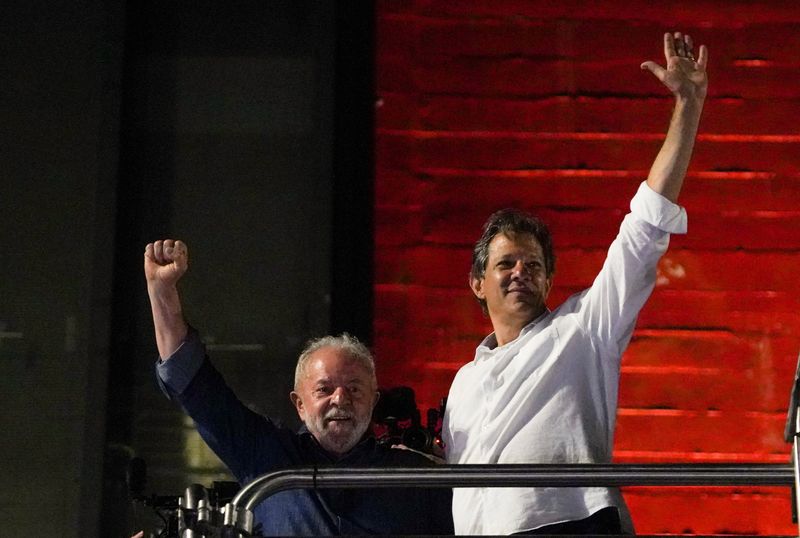 &copy; Reuters. Brazil's former President and presidential candidate Luiz Inacio Lula da Silva and Sao Paulo Governor candidate Fernando Haddad react at an election night gathering on the day of the Brazilian presidential election run-off, in Sao Paulo, Brazil, October 3