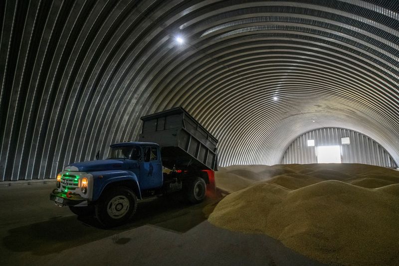 Wheat eases from 2-week top on Black Sea supplies; soy, corn down