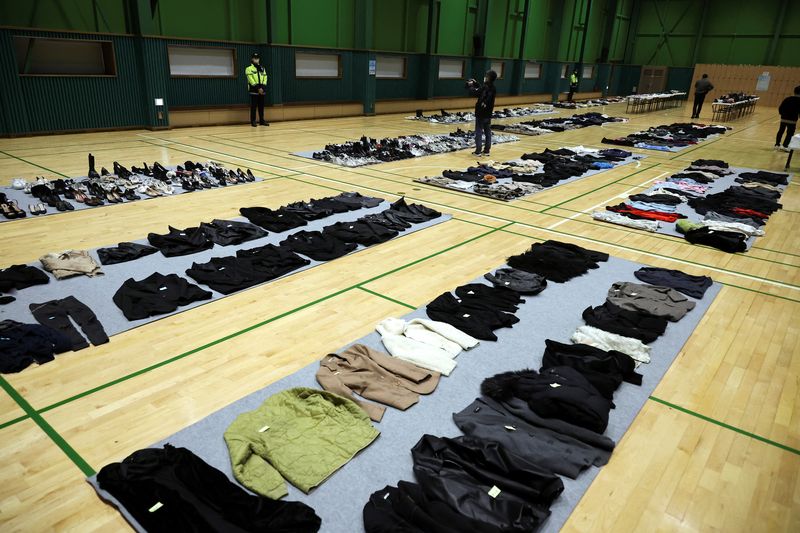 &copy; Reuters. Belongings of victims of a crowd crush that happened during Halloween festivities are kept in a gym in Seoul, South Korea, November 1, 2022. REUTERS/Kim Hong-Ji